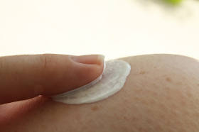applying skin whitening cream